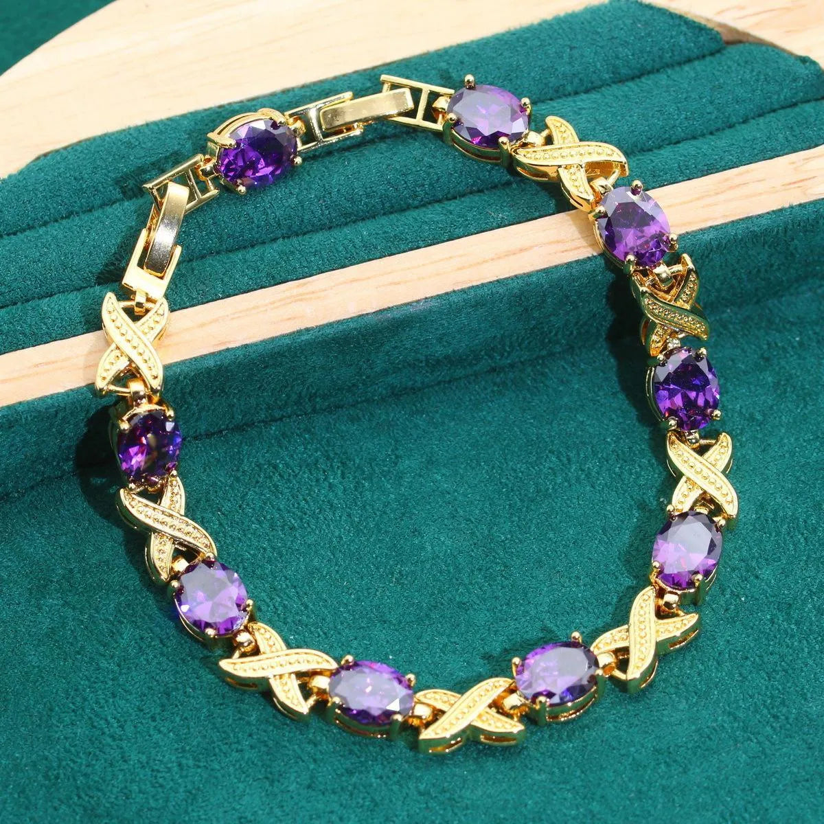18k gold plated jewellery set with multi-colour cubic zirconia stones including necklace, earrings, ring, and bracelet