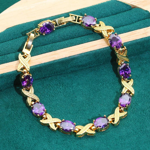 18k gold plated jewellery set with multi-colour cubic zirconia stones including necklace, earrings, ring, and bracelet