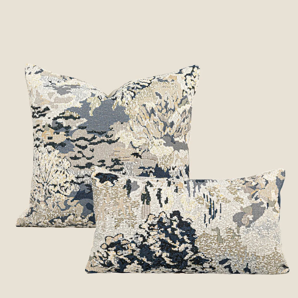 Antique blue decorative cushion with abstract floral pattern, shown in square and waist pillow sizes.