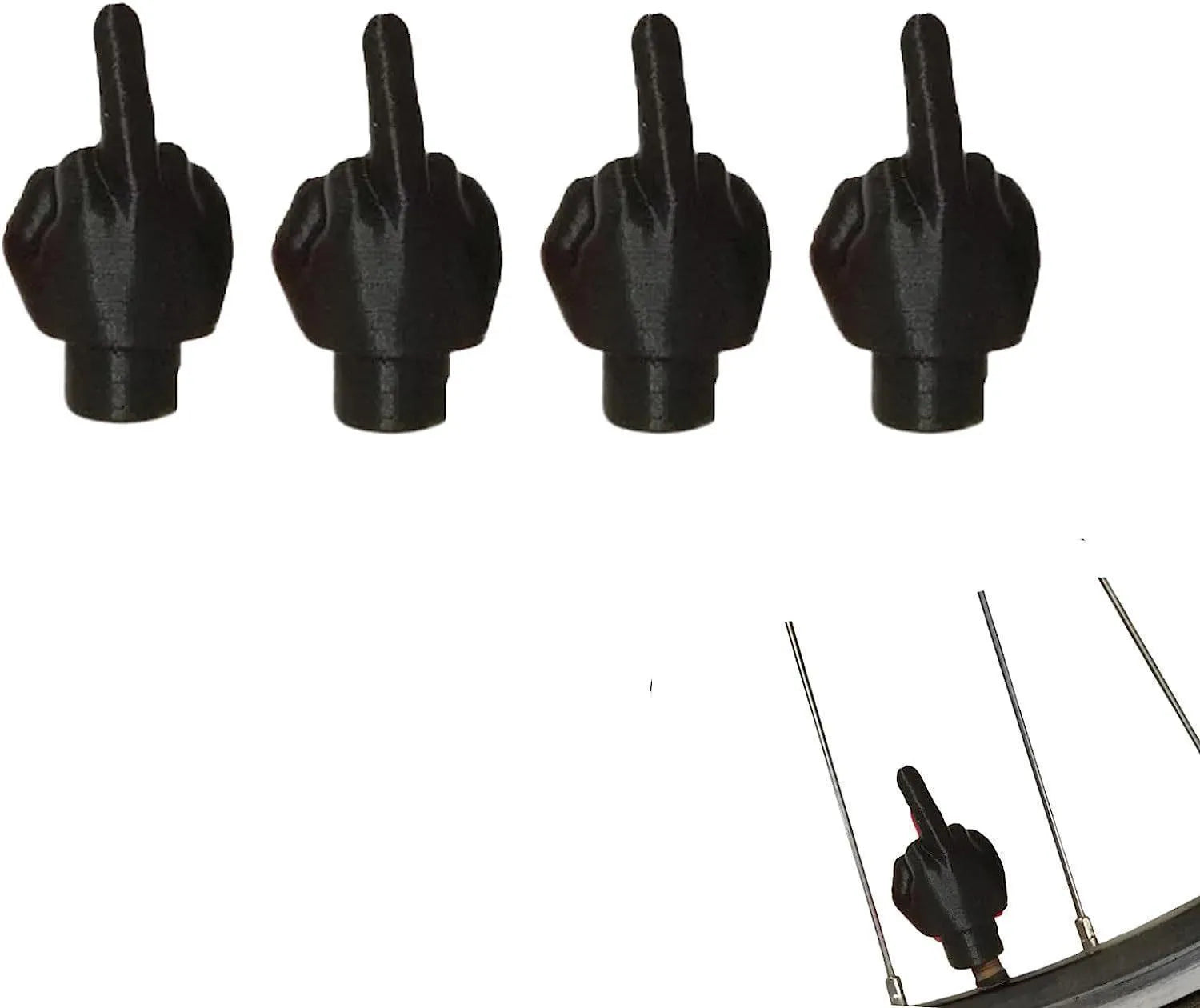 Four latex rubber tyre valve dust caps showing two black and two skin colour pieces