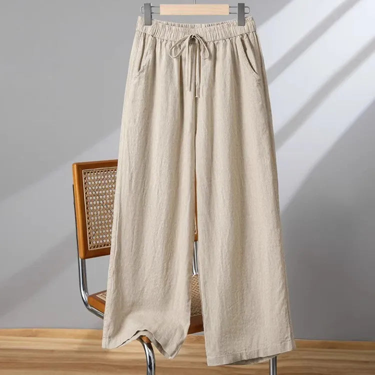 Women's straight-leg casual trousers with elastic waist and drawstring detail in polyester fabric