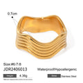 A geometric wave-design ring for women made from silver-toned stainless steel.