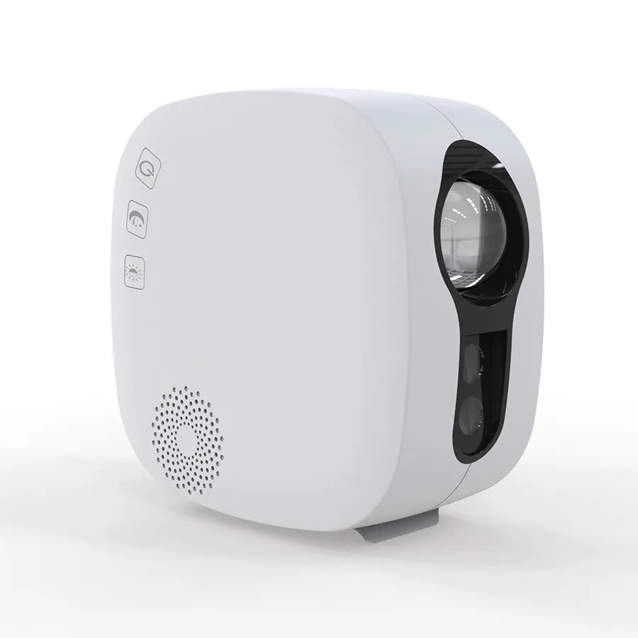Black and white laser star projector with Bluetooth music player showing nebula projection