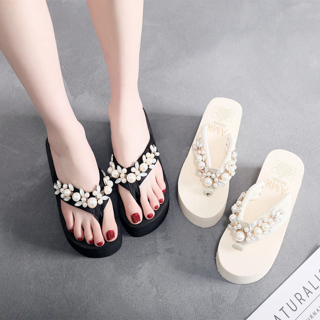 Women's black wedge-heel flip-flops with cotton cloth upper and toe strap