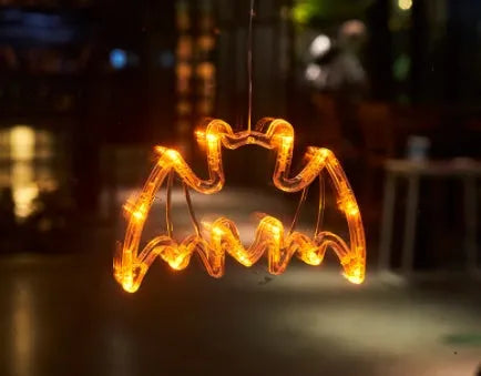 Halloween window hanging LED lights set with spider, pumpkin and ghost designs using battery power