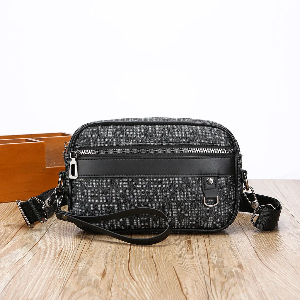 Men's black horizontal messenger bag with geometric pattern and shoulder strap