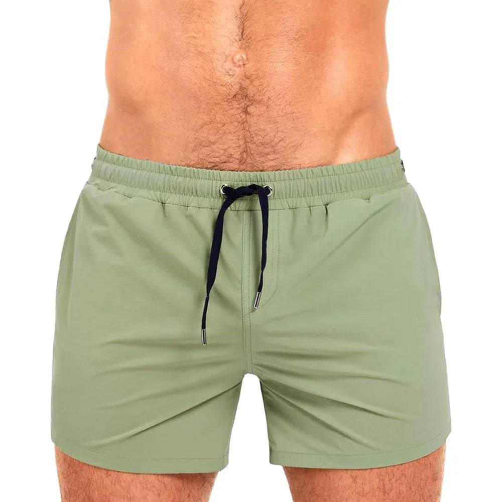Polyester sports shorts with mesh lining in Army Green colour, shown flat.