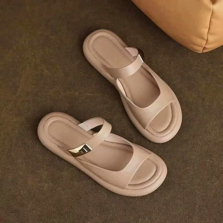 Women's apricot peep toe flat platform sandals with a soft leather upper and rubber sole.