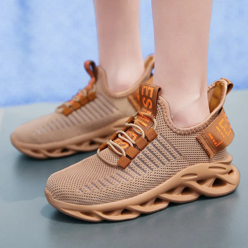 Kids' black casual sneakers with fabric upper, EVA sole, and Velcro strap closure.