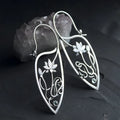 Silver-colour geometric lotus vine earrings with rhinestone centre
