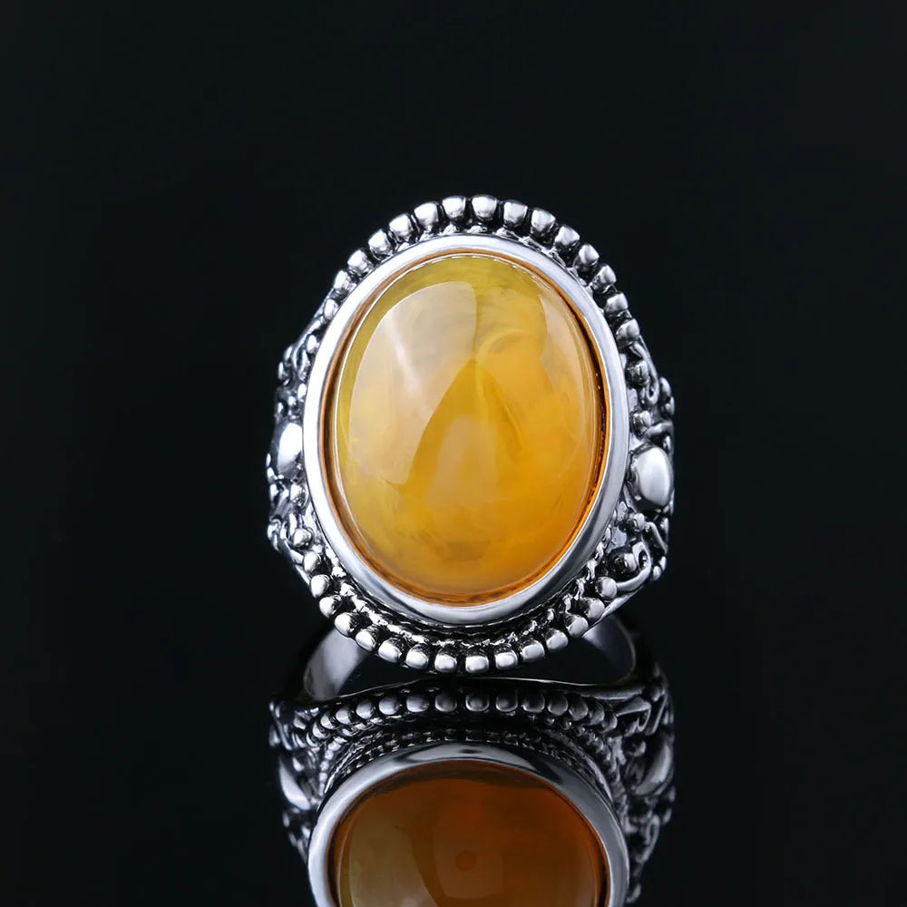Geometric fluorescent beeswax design alloy ring in antique silver amber finish.