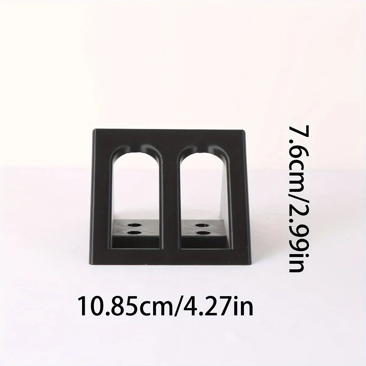 Black punk-style plastic pistol stand for replica firearms measuring 10.85cm tall