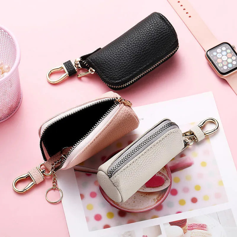 Men's waterproof PU zipper key ring organiser in black, grey, and pink macaron colours
