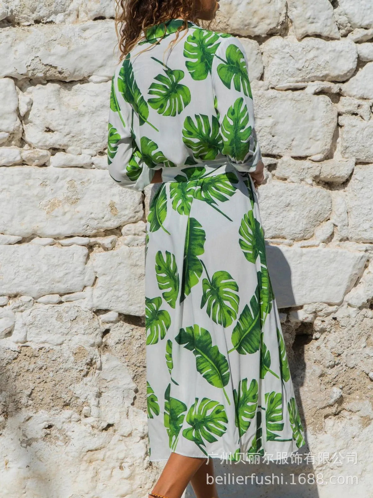 Women's vintage-inspired chiffon summer dress with V-neck and printed A-line skirt.
