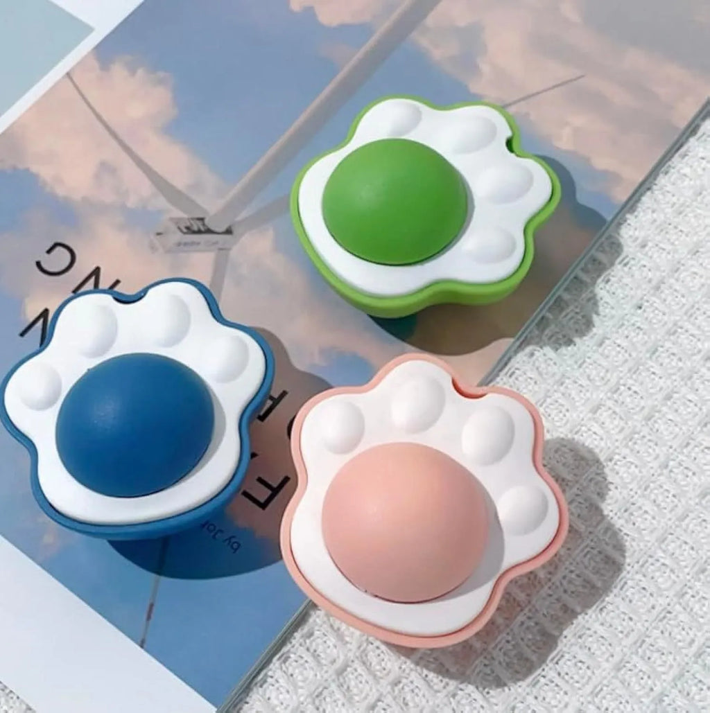 Blue catnip ball with edible vine surface for dental chewing, wall-mounted cat toy