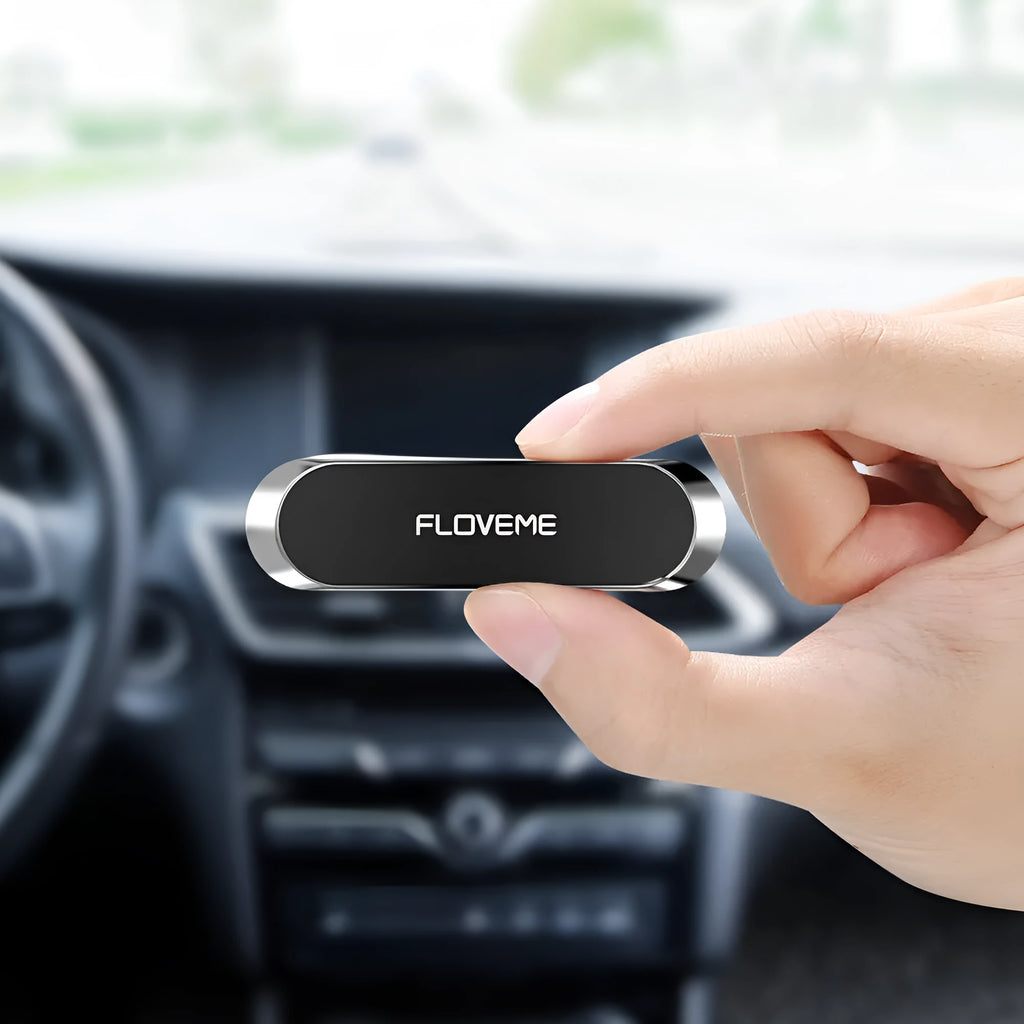 Black magnetic car phone holder with adhesive base showing square silver iron plate and foam glue backing