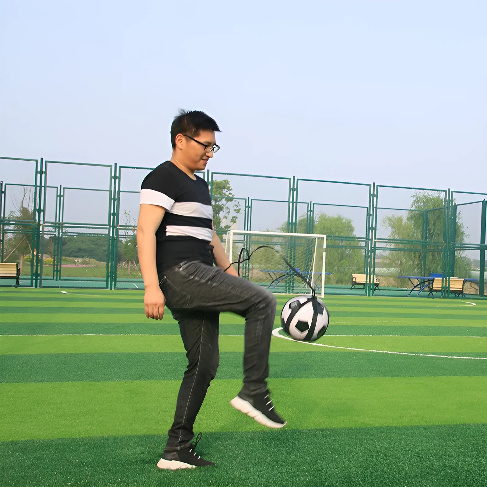Black football training belt with rotating mechanism and 2-metre static cord