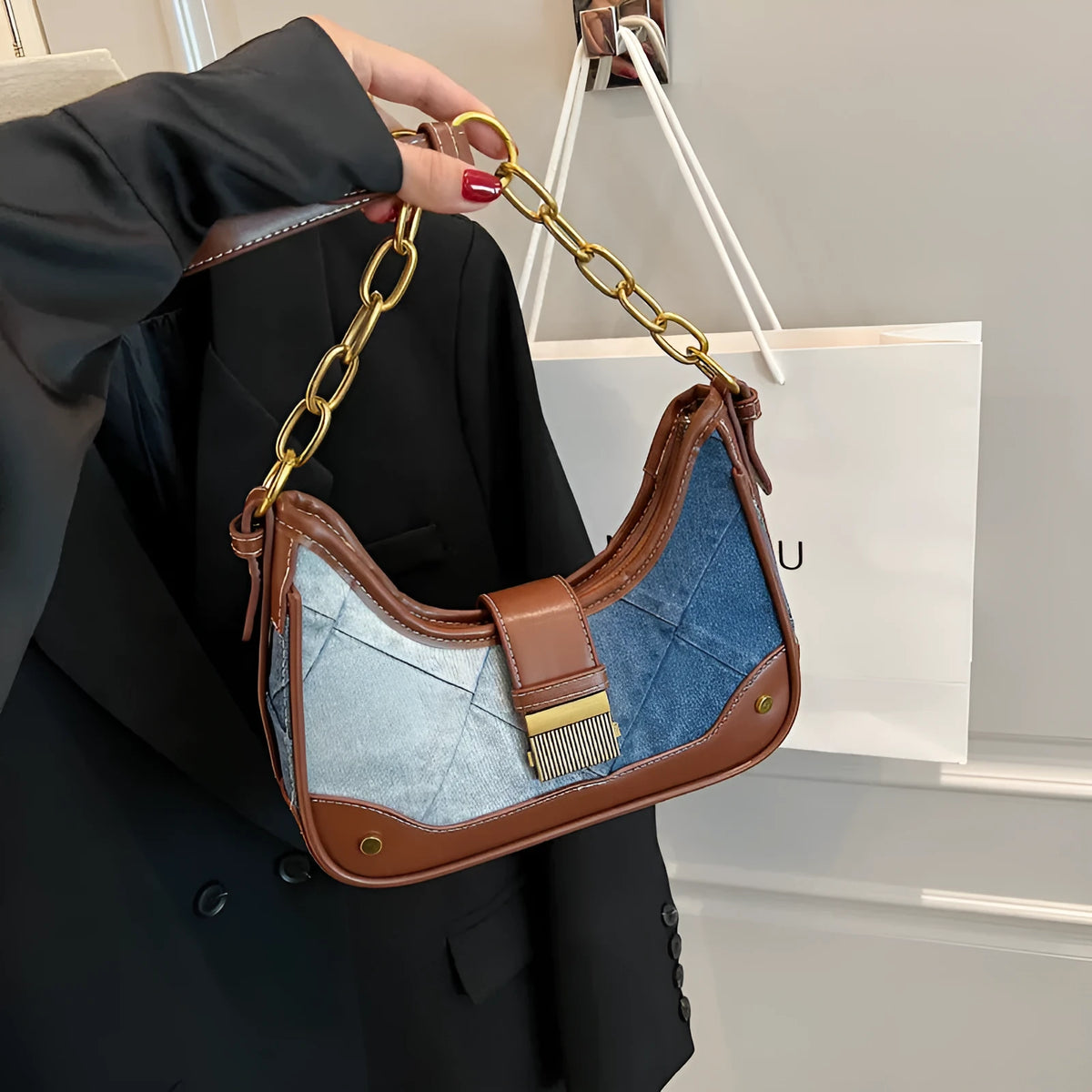 Brown denim women's shoulder bag with diamond mesh panel and chain strap detailing