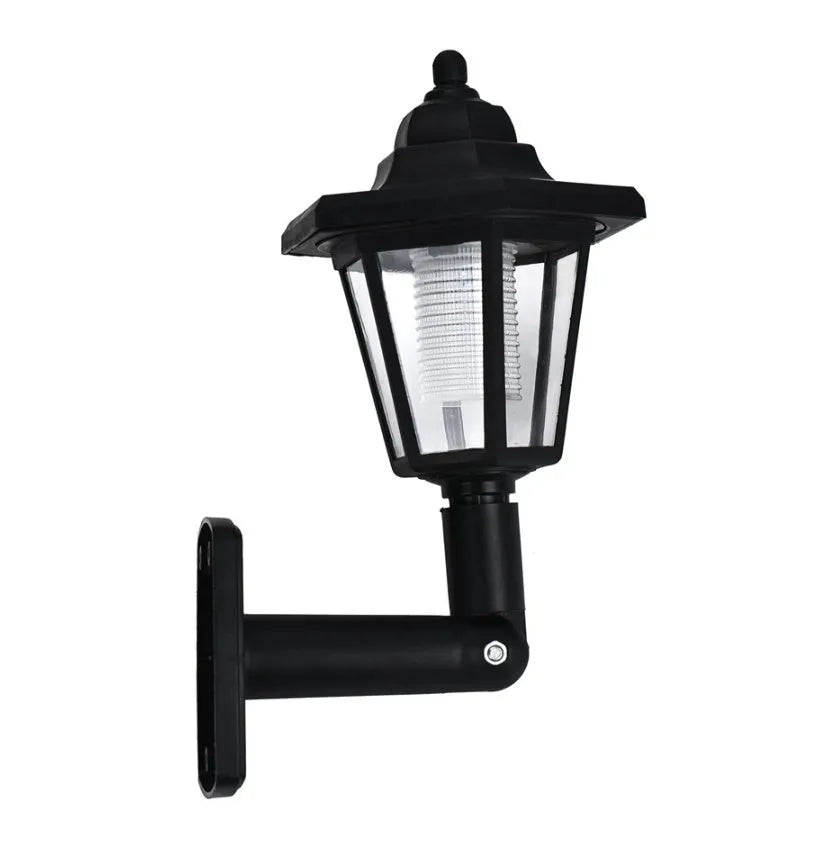 Black hexagonal solar wall lamp with solar panel and LED light for outdoor installation