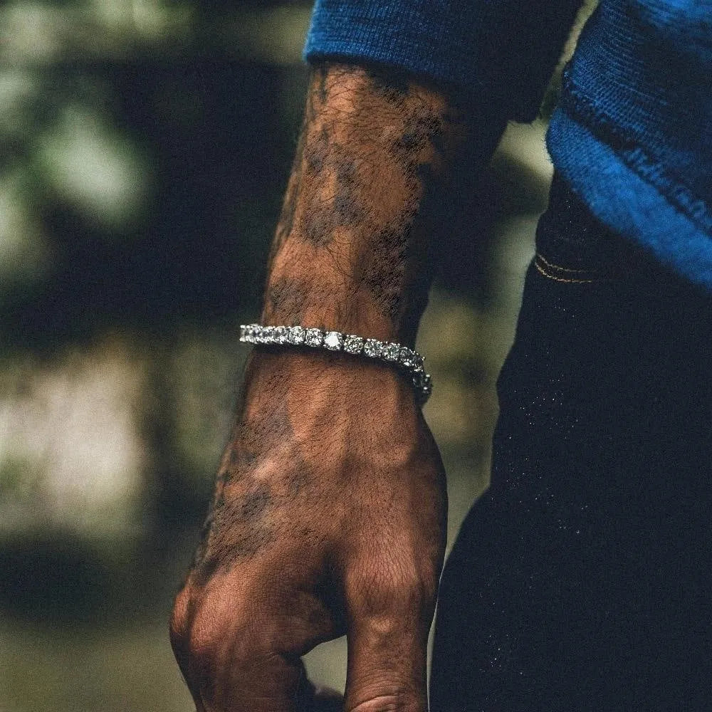 Men's geometric chain link bracelet with single row iced-out rhinestones and tennis charm styling