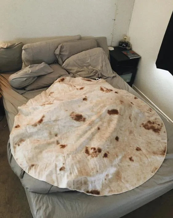 Round burrito blanket with coral fleece texture and food-themed print