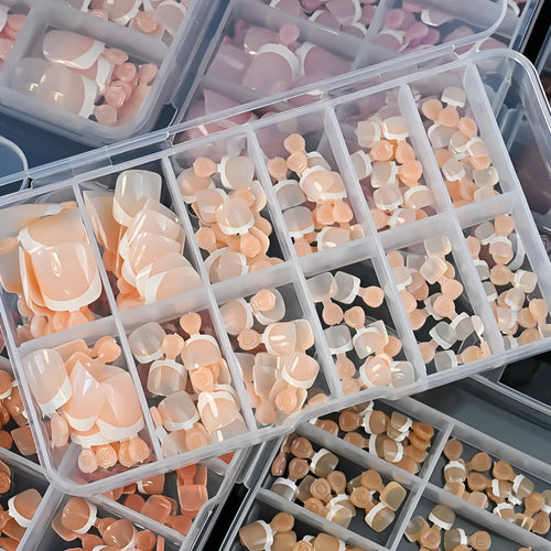 Box of 120 square short false nail pieces with French white edge design in nude colours