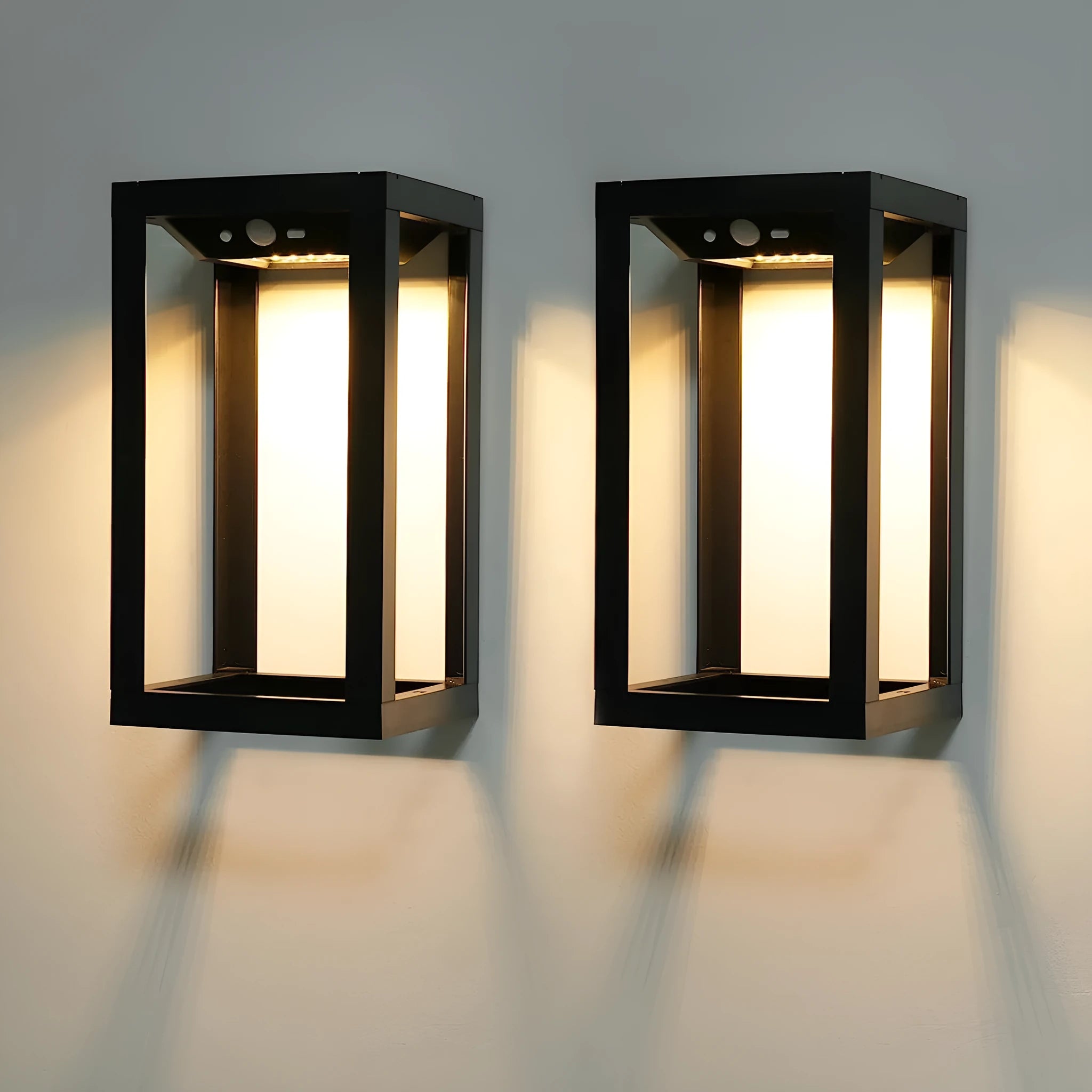 Modern Chinese-style outdoor solar wall lamp with plastic shell, shown in a garden setting.
