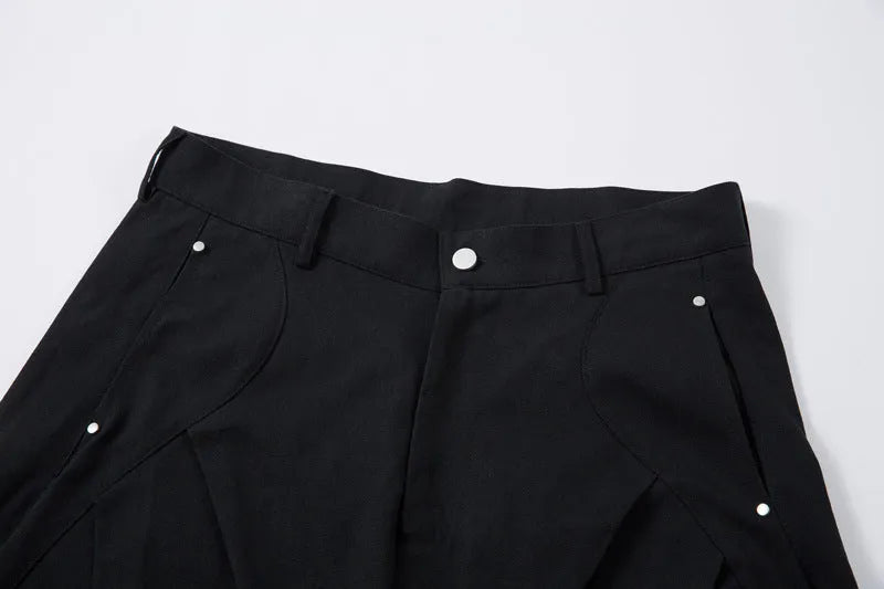 Men's black pleated machete casual trousers with wide-leg loose fit and cotton fabric