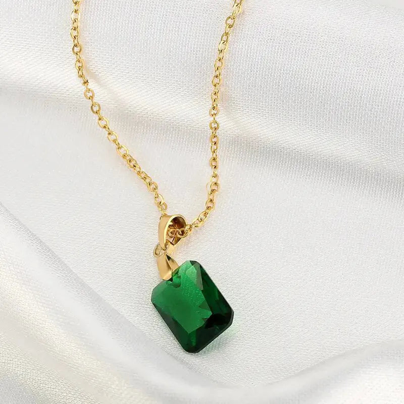 Copper rectangular geometric pendant necklace on O-ring chain in green colour.