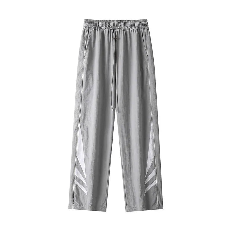 Men's straight-leg casual trousers in grey, showing elastic waistband and thin summer fabric.