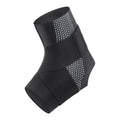 Black Lycra ankle support brace shown on adult ankle with adjustable sizing tab visible