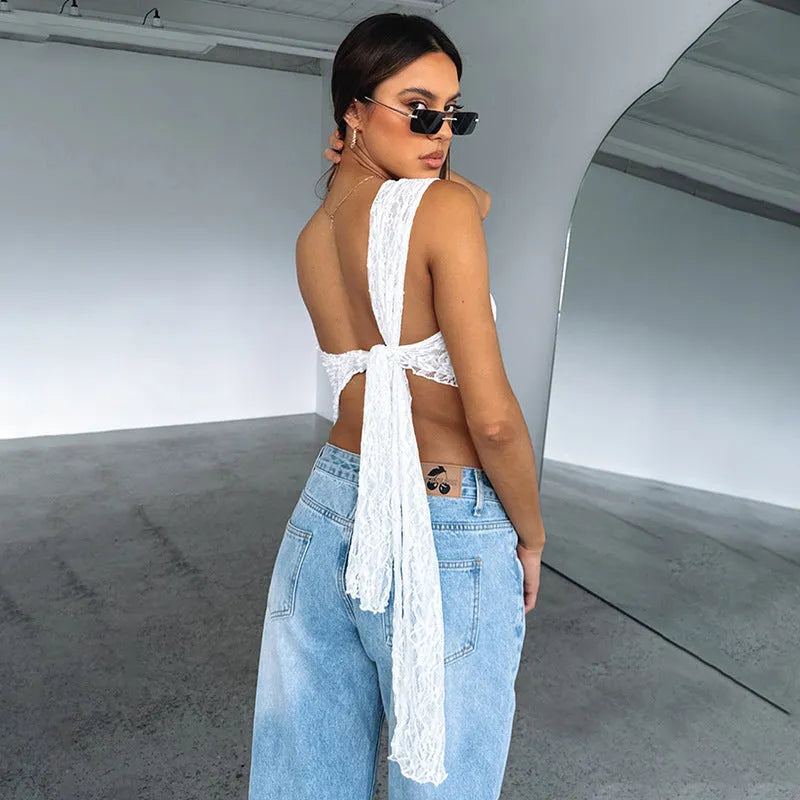 Women's lace backless top with asymmetrical neckline in solid colour