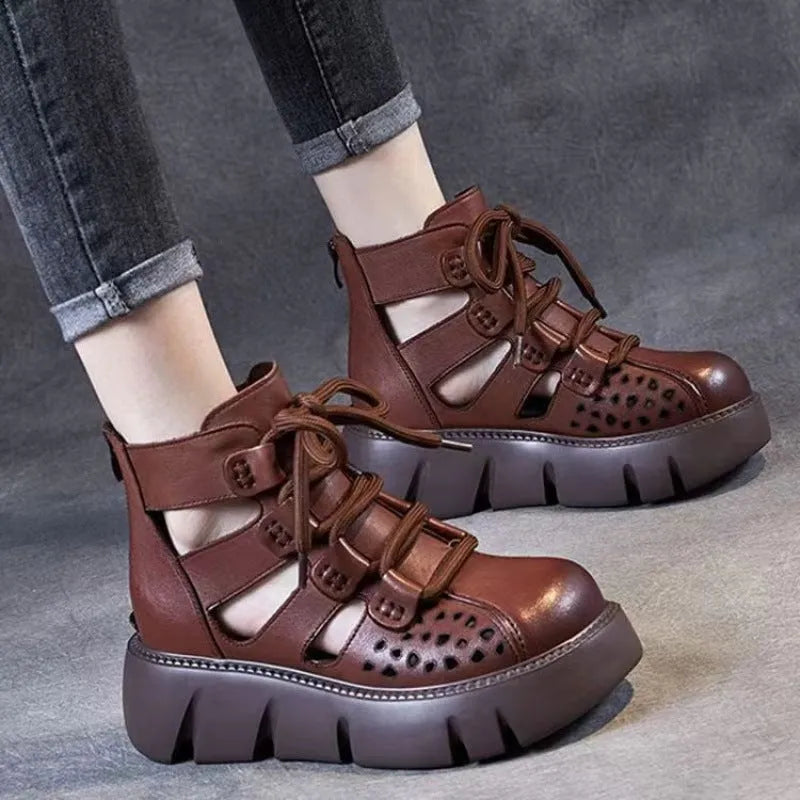 Women's black platform sandals with hollow hole design and fish mouth toe in soft cowhide leather.
