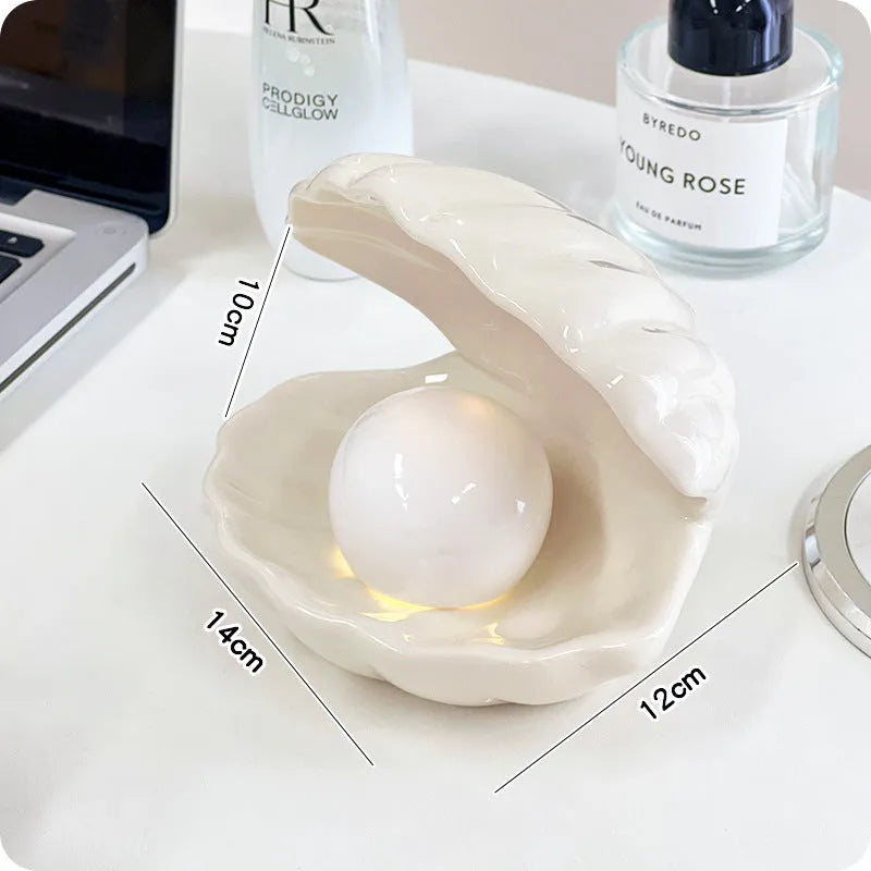 White porcelain storage tray with integrated small night light in modern minimalist style.
