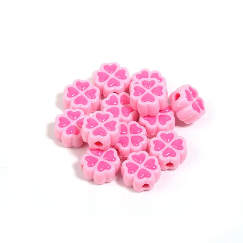 Acrylic four-leaf clover love beads with frosted finish in assorted light colours, 15mm size