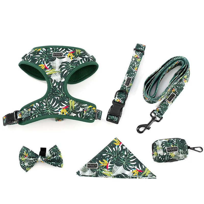 Adjustable cloth dog harness set with leash, collar, waste bag, bow, and bib accessories