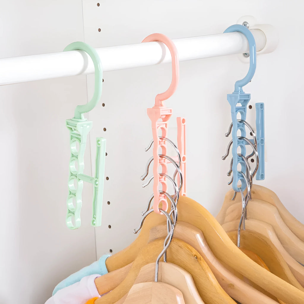 Rotating wardrobe hanger with five holes and handle in blue, green, or pink colour options