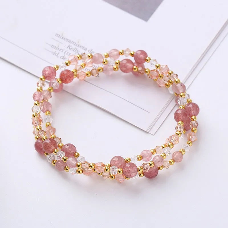 Women's adjustable crystal bracelet with three-ring beads on a cord in tourmaline, strawberry quartz, or amethyst