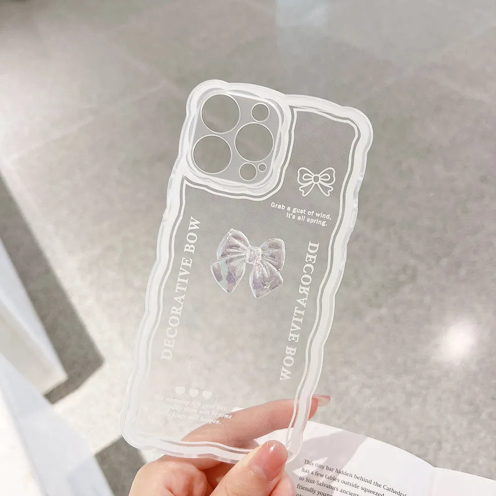 Transparent iPhone case with a raised 3D ice-through bow on a white background.