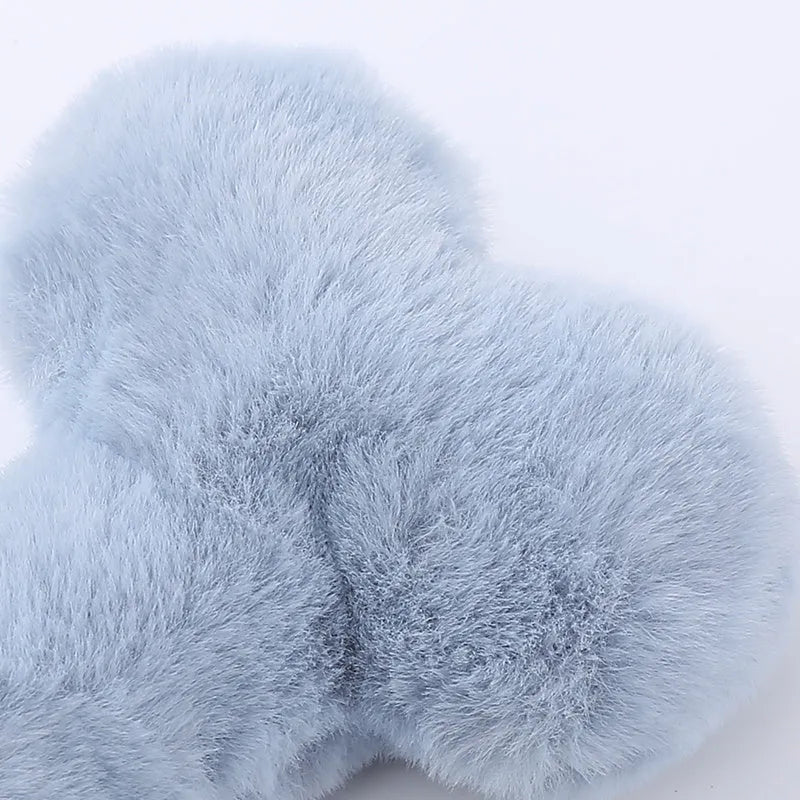 Plush love bone dog toy with squeaker in blue pink yellow colours