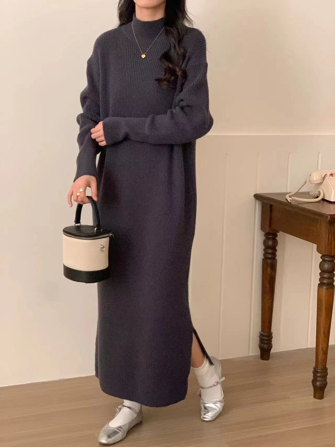 Half turtleneck acrylic knitted dress in midi length with long sleeves and high waist