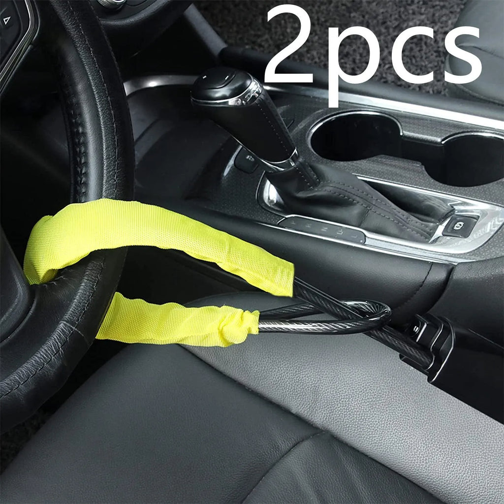 Red iron car steering wheel lock with copper core for General Motors vehicles.