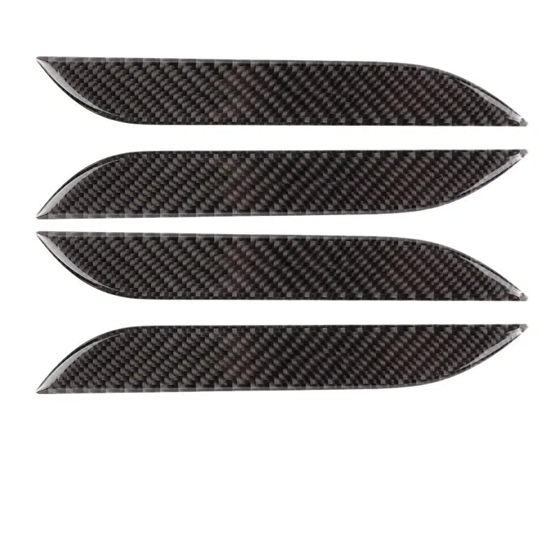 Four carbon fibre adhesive door handle protection patches for Tesla Model S with drip texture finish