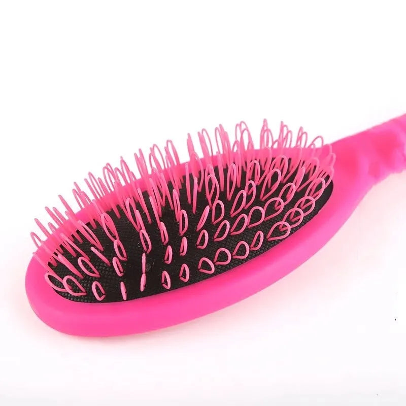 Black and pink ring tooth hair extension comb with airbag cushioning, 22cm length
