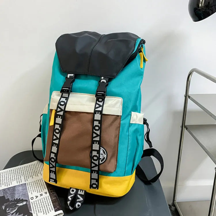 Oxford cloth school backpack in black, green, or red with handheld, shoulder and backpack carrying options