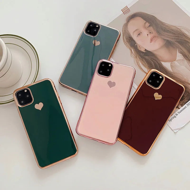 Solid colour TPU phone back cover for iPhone, shown in Blue, Claret, Pink, and Green.