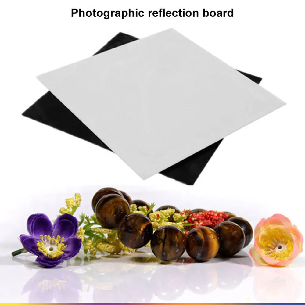 Square black and white acrylic reflection board for tabletop photography.