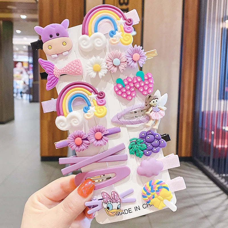 14 piece toddler hair accessories set showing colourful rainbow, candy, fruit, and butterfly shaped barrettes and clips.