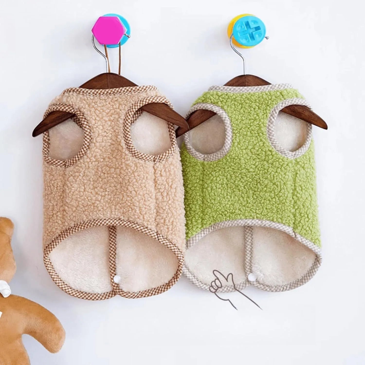Green coral fleece dog vest with a metal leash ring on the back, sized for a small dog.