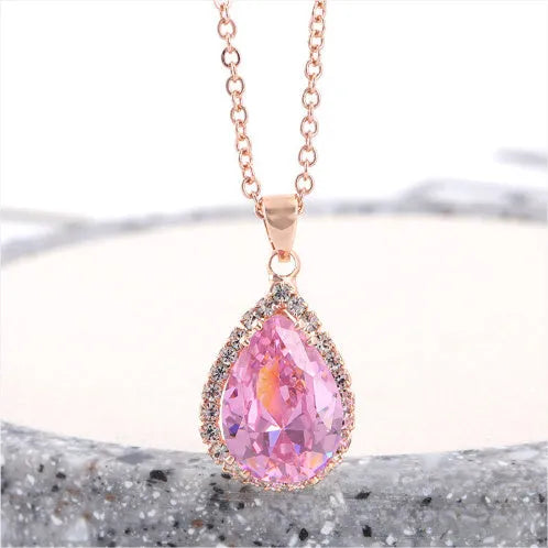 Drop shape women's necklace with rose gold electroplating and rhinestone geometric design in pink colour